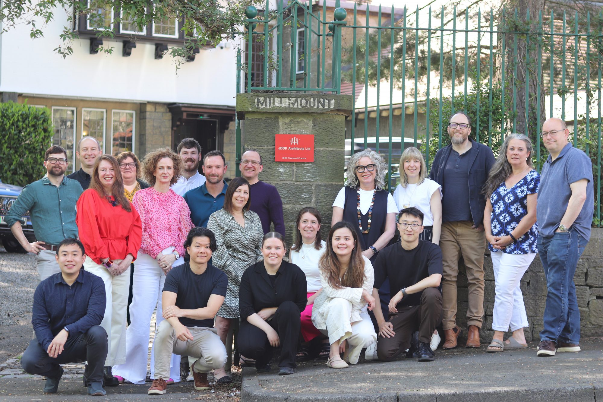 JDDK Office group photo with RIBA plaque
